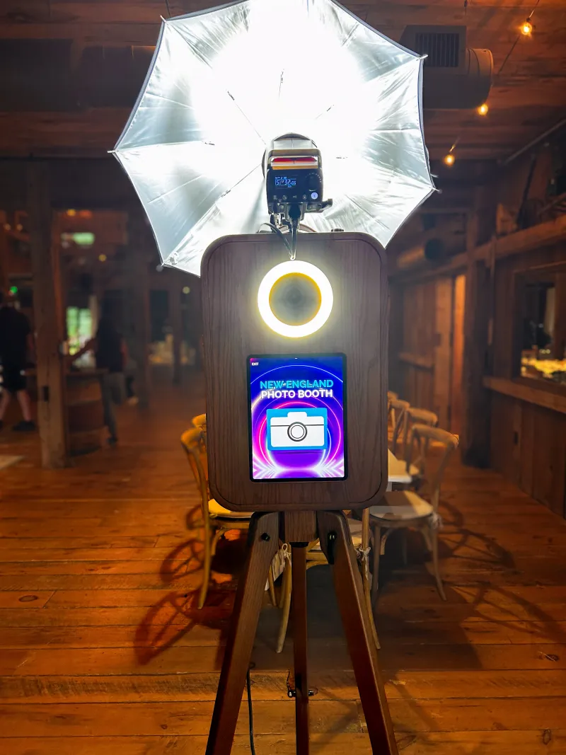 Guests laughing inside the Flashback photo booth